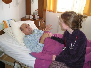 hospice worker with patient